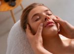 female-masseur-giving-back-massage-client_23-2150461452