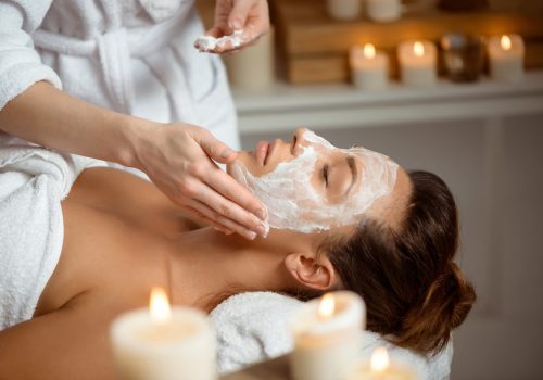 young-woman-mask-face-relaxing-spa-salon_176420-7573